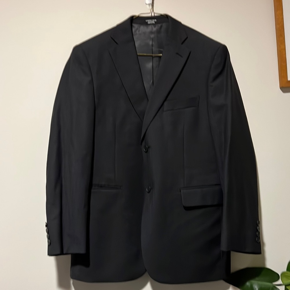 Dark grey wool suit.
